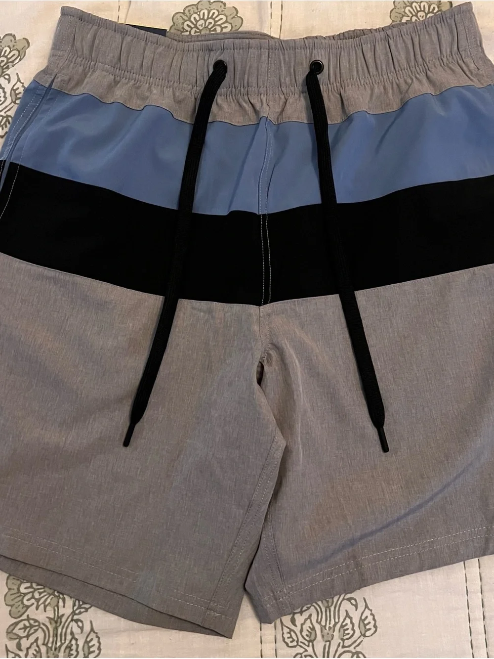 Adilette comfort slides with Nautica swim trunks